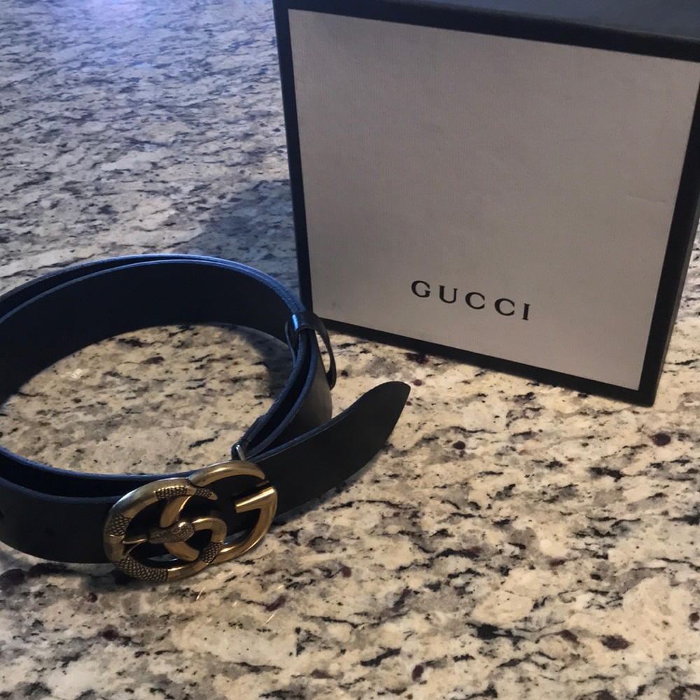Double G snake Gucci belt.